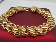 Bracelet à chaîne gourmette en or jaune 18 carats et diamants